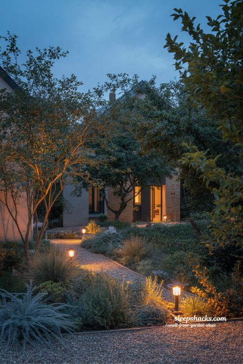small front garden soft evening lighting solar path lights warm cozy dusk landscape design 