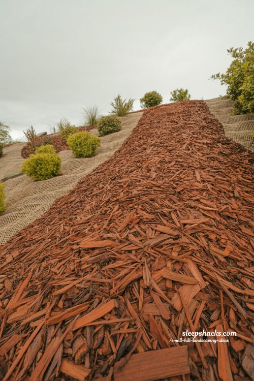 small hill landscaping ideas with mulch glue erosion control for steep slope stabilization and garden protection