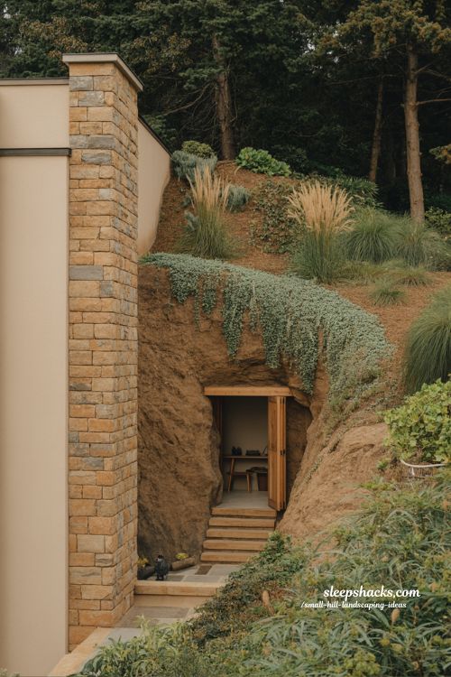 small hill landscaping ideas with retaining wall integrated garden shed built into hillside design