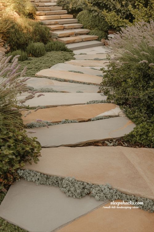 small hill landscaping ideas with stone slab steps for a luxurious natural hillside garden staircase