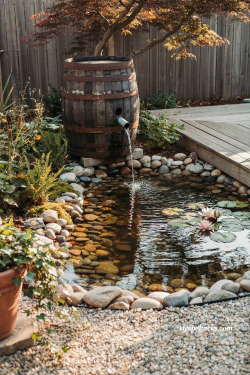 Barrel waterfall pond idea with rustic wood containers and small garden pond design