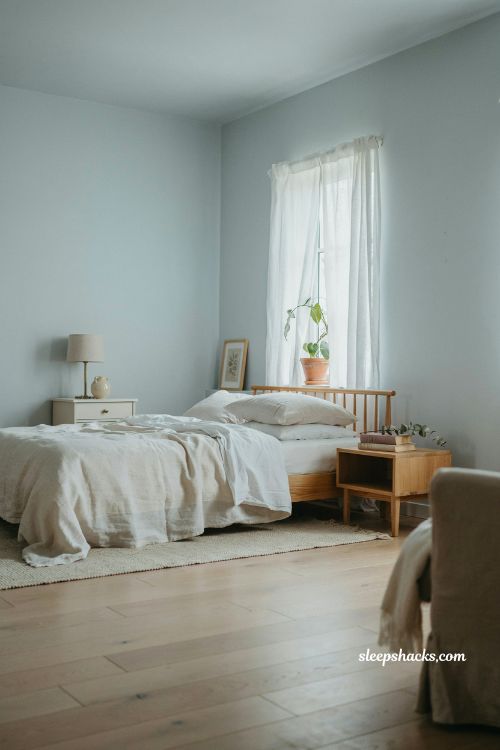 Blue and white bedroom ideas with soft powder blue walls and airy calm minimalist bedroom design