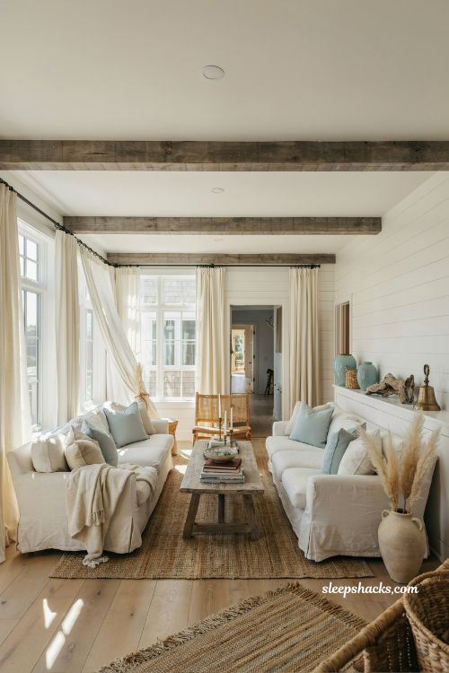 Coastal cottage living room ideas with airy white interiors and natural textures