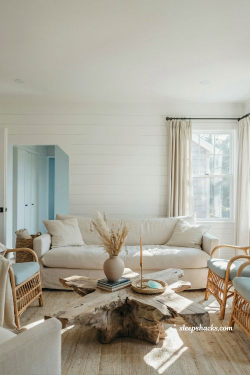 Coastal cottage living room ideas with driftwood coffee table natural coastal texture and organic living room styling
