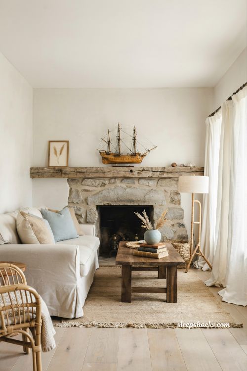 Coastal living room with vintage ship model mantel decor and collected cottage style