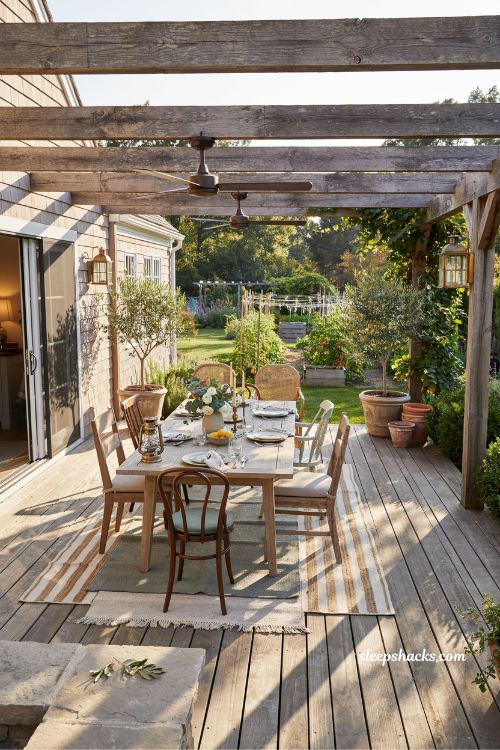 Covered backyard deck with roof design for comfortable outdoor living