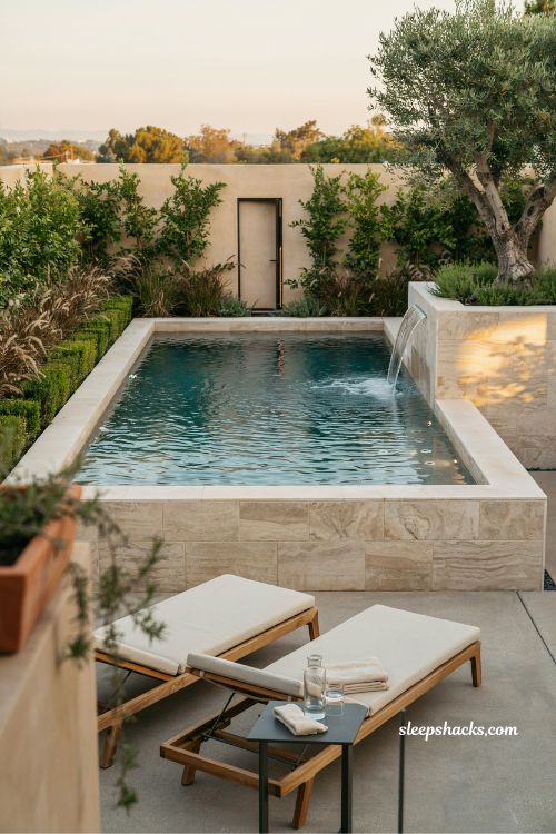 Custom spool pool spa combo design with stone veneer and water feature
