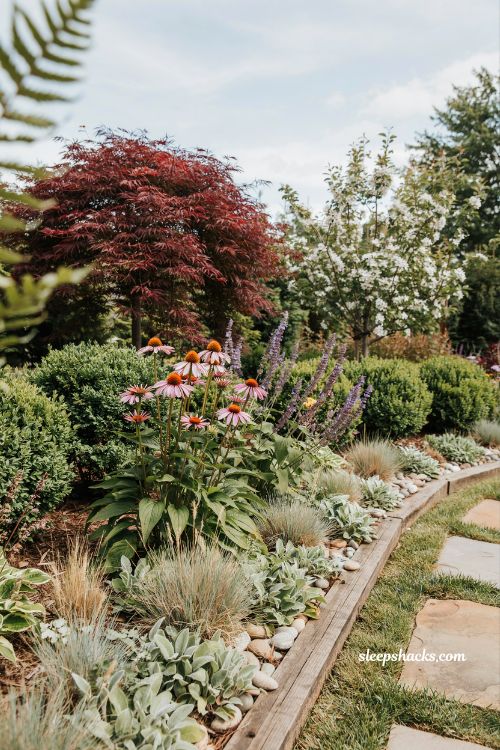 Garden landscape design ideas with layered planting for depth texture and natural garden structure
