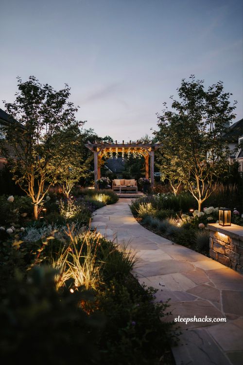 Garden landscape design ideas with outdoor lighting path lights and pergola evening ambiance landscape design
