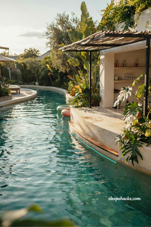 Lazy river pool with swim up bar along the route backyard resort design ideas