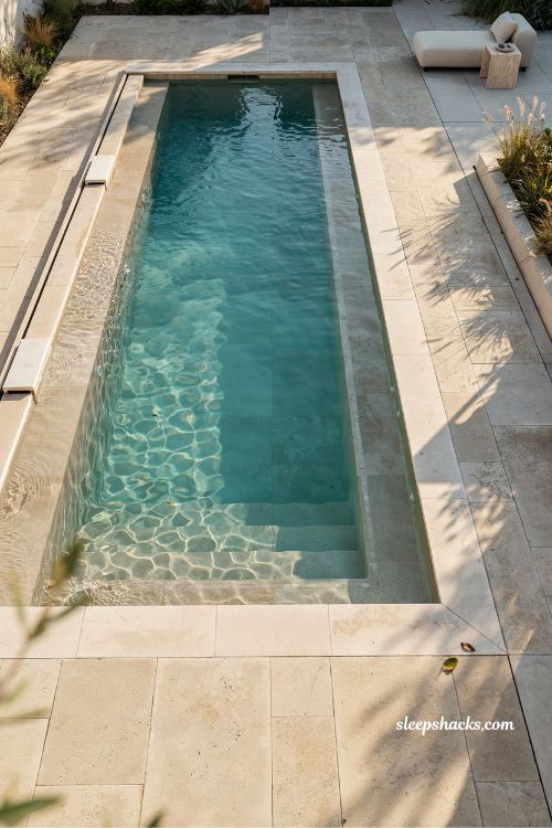Long sun shelf rectangular pool design doubling as a lap lane idea