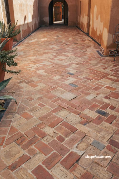 Mexican hacienda patio ideas with paver patterns flagstone brick and rustic courtyard flooring design