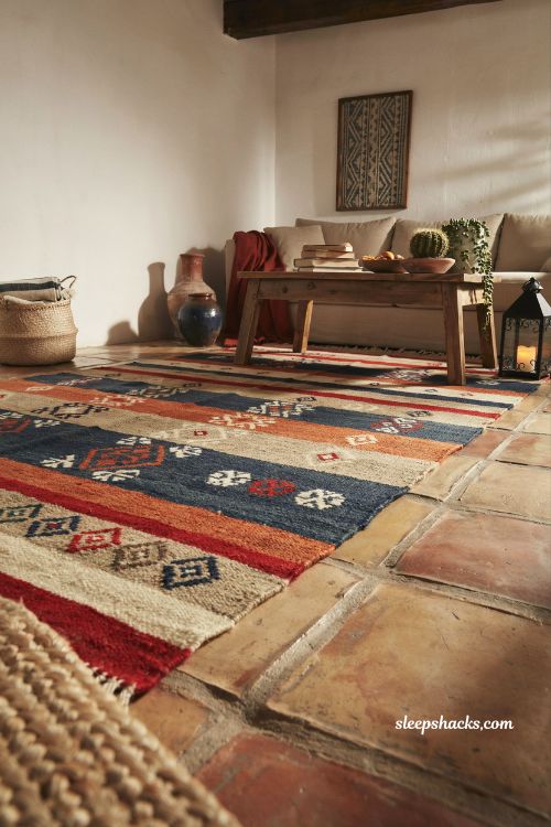 Mexican home decor ideas Zapotec woven rugs oaxaca geometric textile Saltillo tile rustic hacienda living room floor styling