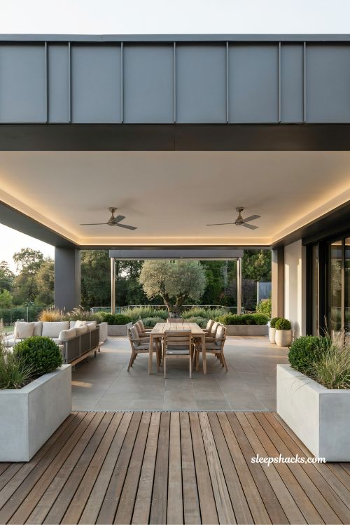 Modern deck with insulated roof panels for year-round outdoor comfort
