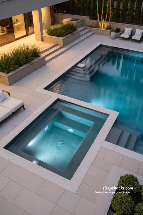 Modern rectangle pool with integrated spa and spillover hot tub design ideas for luxury backyards