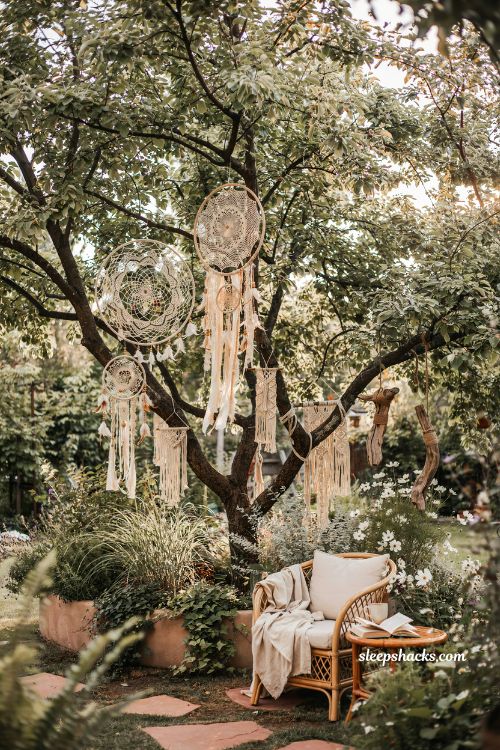 Whimsical backyard ideas with hanging dream catchers boho garden decor and tree canopy styling