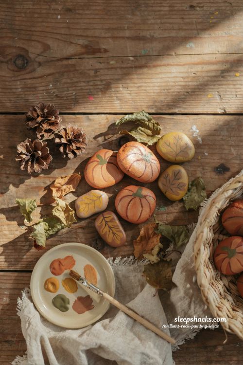 autumn leaves and pumpkin rock painting ideas cozy fall stones with warm harvest colors