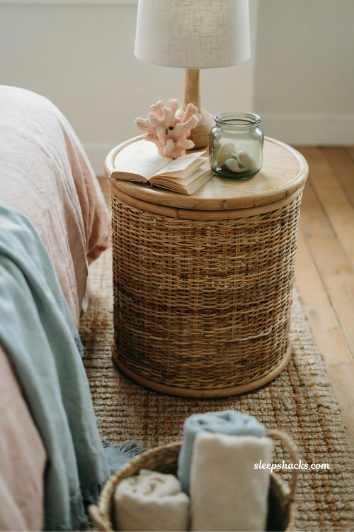 coastal nightstand styling with shell and coral decor pink and blue bedroom bedside aesthetic ideas