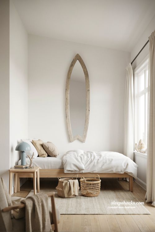 coastal teen bedroom with surfboard mirror statement wall and relaxed beach surf aesthetic interior design