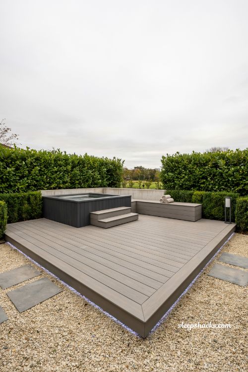 composite decking hot tub ideas for a modern low maintenance backyard spa platform