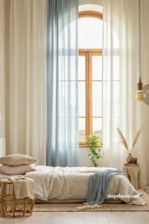 floor to ceiling linen curtains white and ice blue coastal bedroom idea for airy seaside light filled space