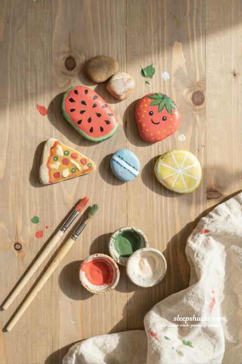 food themed rock painting ideas playful fruit and snack stone art for colorful DIY inspiration