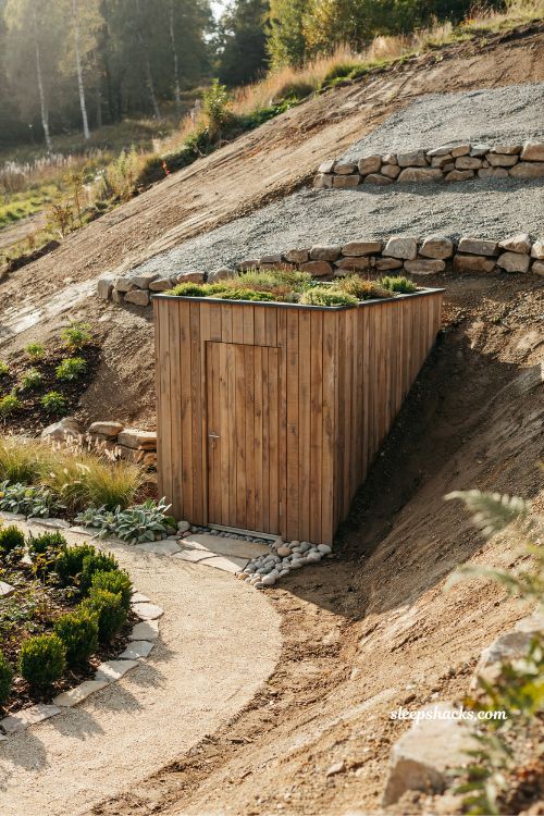 garden shed built into hillside ideas for small sloped backyard integrated storage design