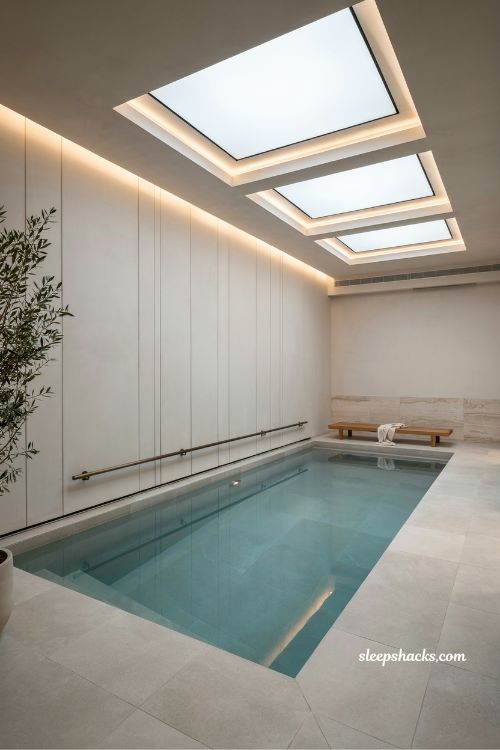 indoor pool design for year round swimming with modern spa style villa wellness aesthetic