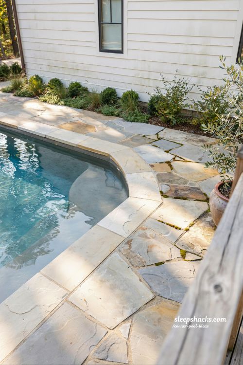 natural stone surround rustic corner pool design limestone bluestone backyard farmhouse pool ideas