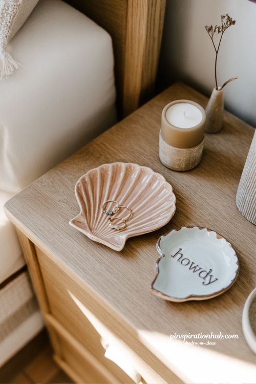 seashell jewelry tray coastal cowgirl nightstand with ceramic howdy dish candle and blush blue boho bedroom decor