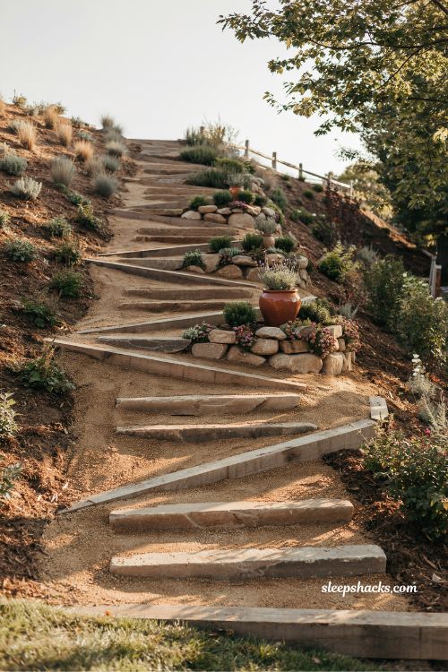 switchback stairs for steep small sloped backyard landscaping ideas with terraced landings