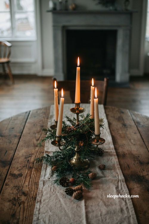Antique brass advent candle holder wrapped in fresh cedar and eucalyptus for christmas