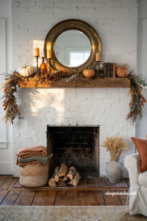 Autumn fireplace decor with a natural foliage garland and cozy farmhouse mantel