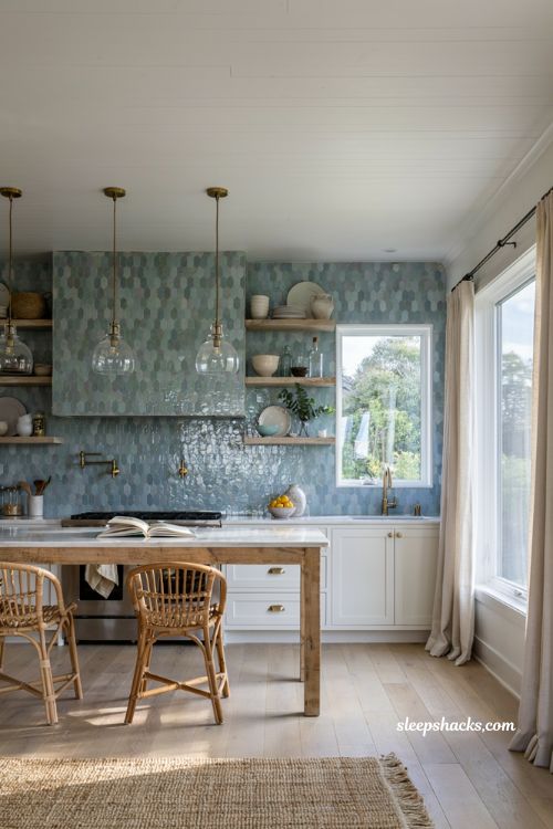 Beachy kitchen decor ideas with colorful sea glass tile backsplash and white cabinets
