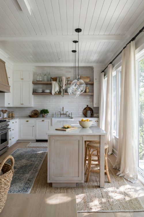 Beachy kitchen decor ideas with layered jute rugs and natural fiber coastal textures