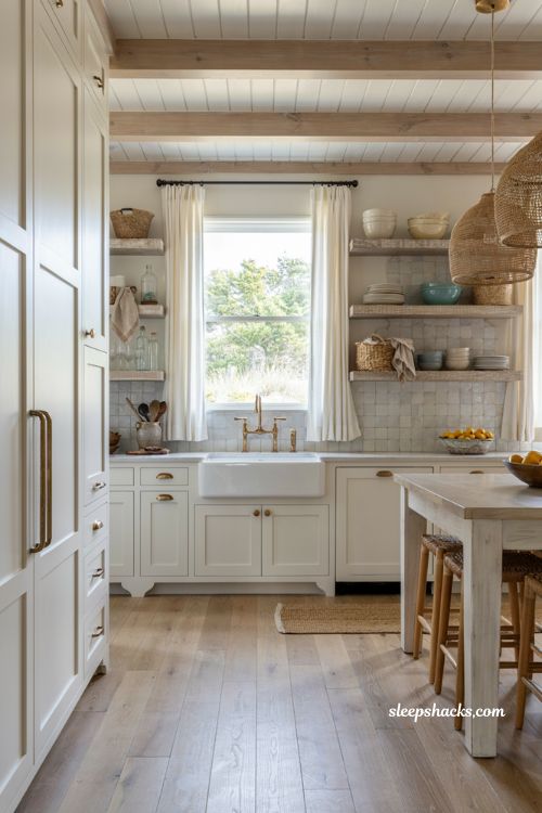 Beachy kitchen decor ideas with white apron front farmhouse sink and coastal accents