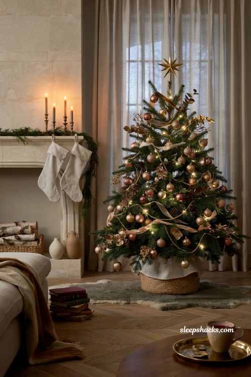 Burnished gold and bronze Christmas tree with elegant metallic holiday decor ideas