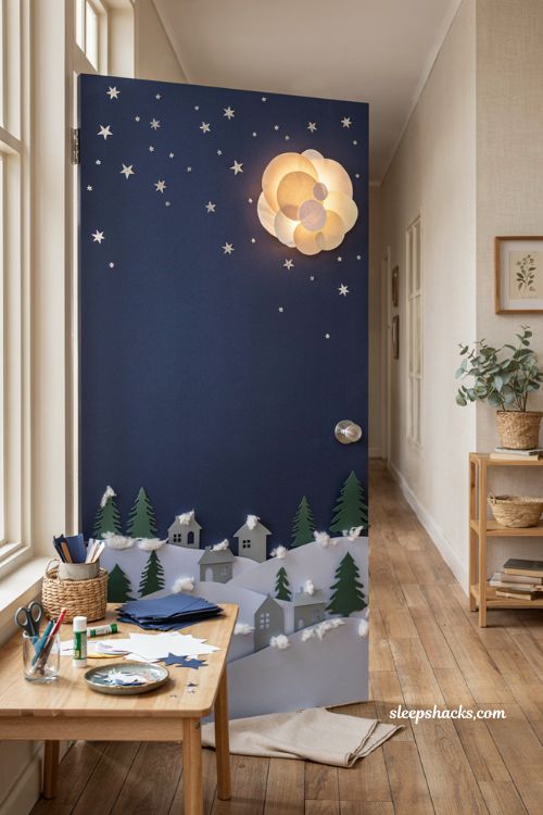 Christmas classroom door decorations with silent night winter scene and paper stars