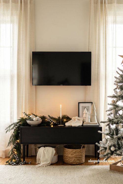 Christmas decor ideas for a black living room tv stand with modern black and white styling