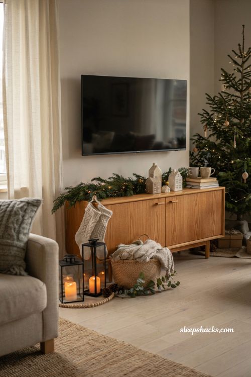 Christmas decor ideas for a living room tv stand with cozy hygge holiday styling