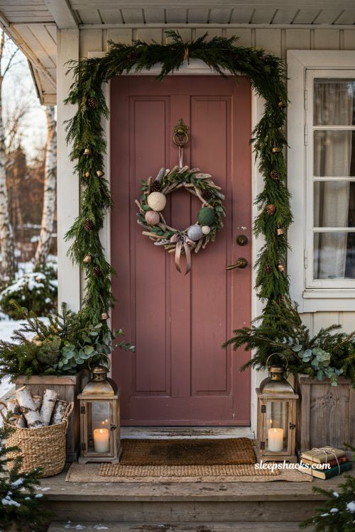 Christmas front door ideas with yarn wrapped ornament wreath and rustic driftwood holiday decor