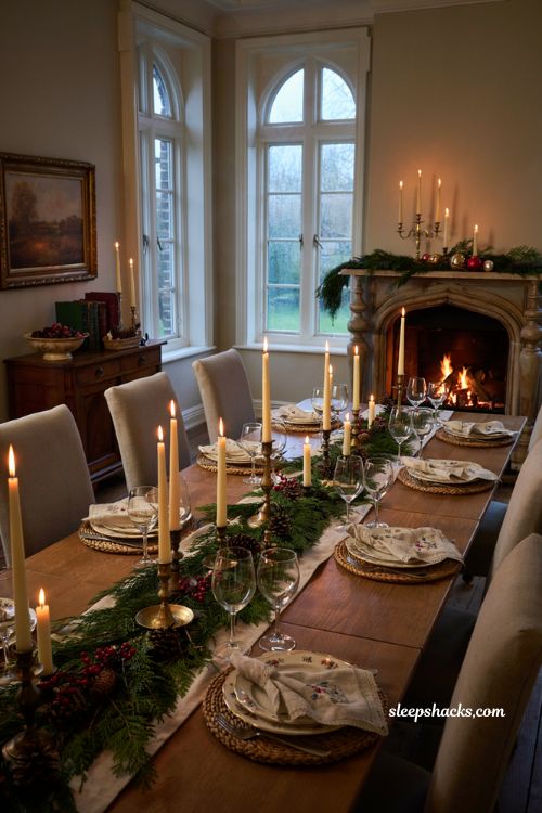 Classic christmas decor with layered candles and evergreen centerpiece