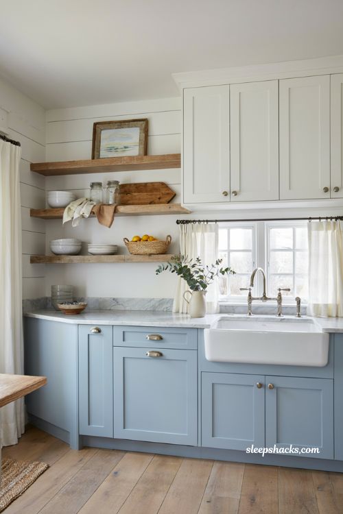 Coastal farmhouse kitchen ideas with powder blue lower cabinets and white uppers