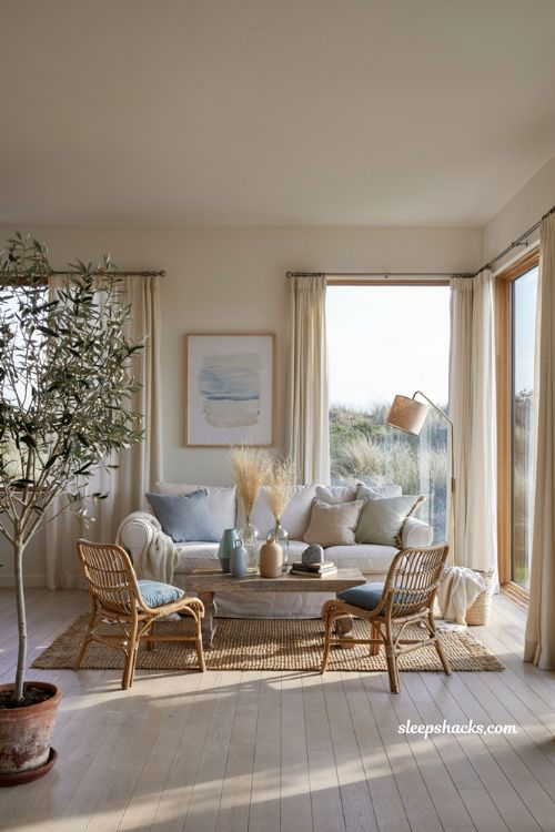 Coastal-inspired living room with sandy beige and sea blue color palette