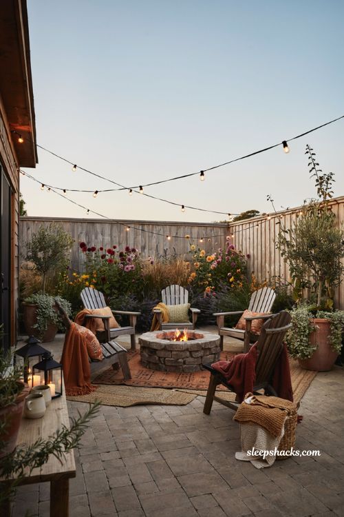 Colorful backyard ideas with bright cushions and cozy fire pit seating