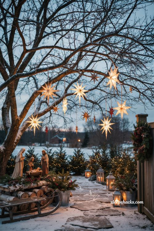 Diy Christmas yard decorations with glowing stars hanging from tree branches