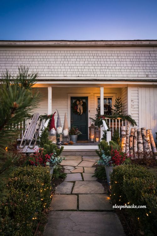 Diy Christmas yard decorations with tomato cage gnomes and rustic front porch display