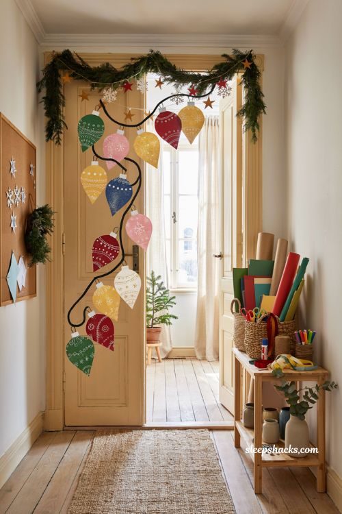 Diy christmas classroom door with colourful paper ornament bulb display