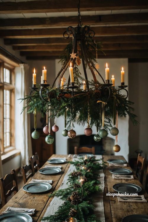Diy fresh evergreen and paper snowflake decorated chandelier for Christmas dining room decor