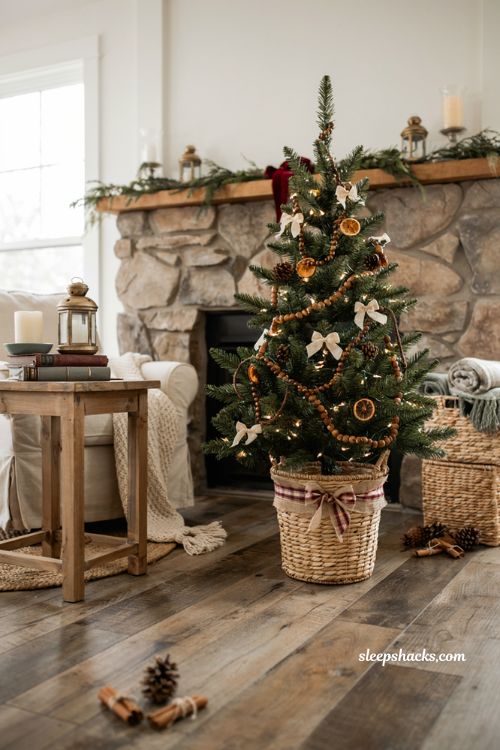 Dollar tree mini christmas tree ideas with a woven laundry basket tree collar in a cozy farmhouse living room
